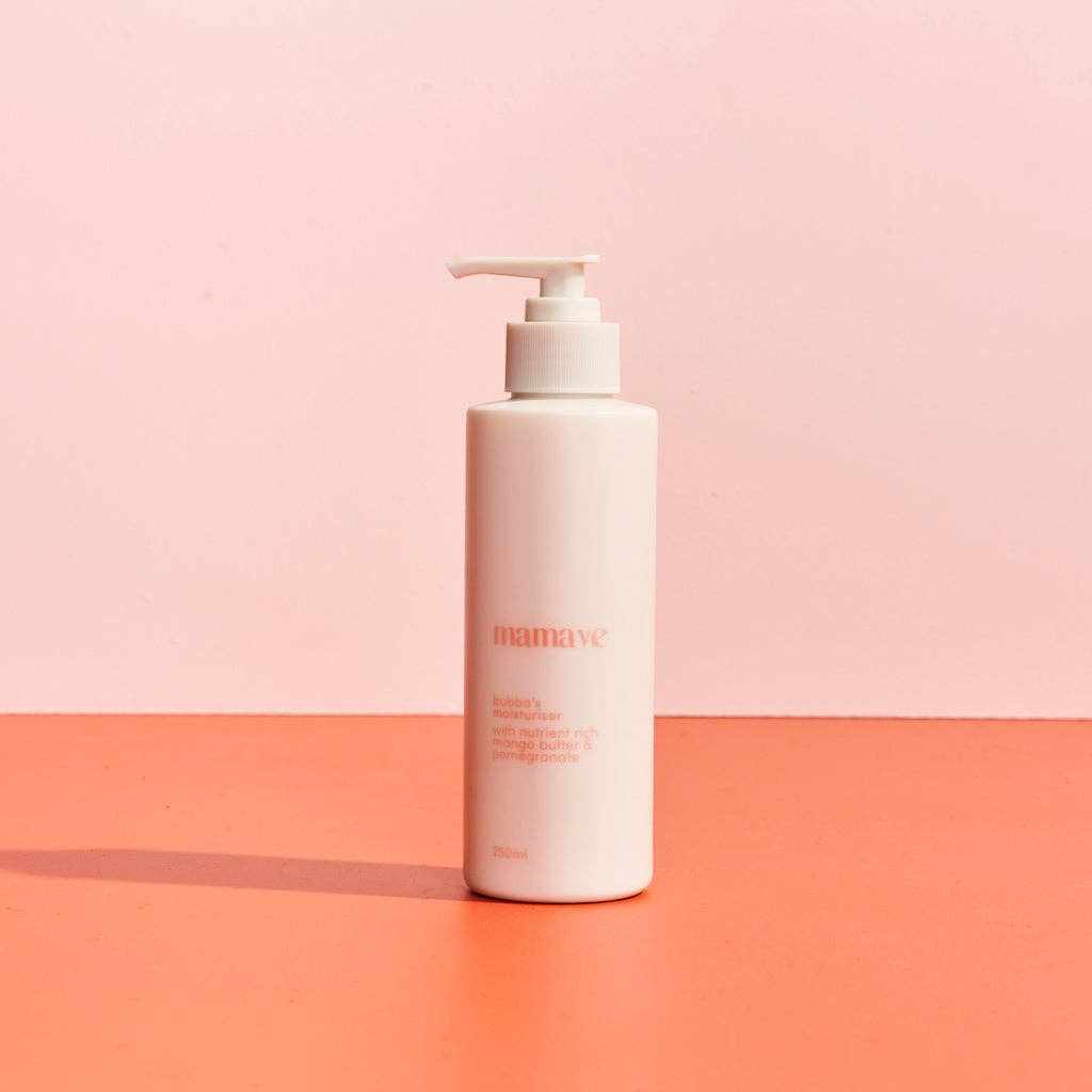 Bubba's Moisturiser bottle with plant-based ingredients for nourishing baby skin on pink and orange background