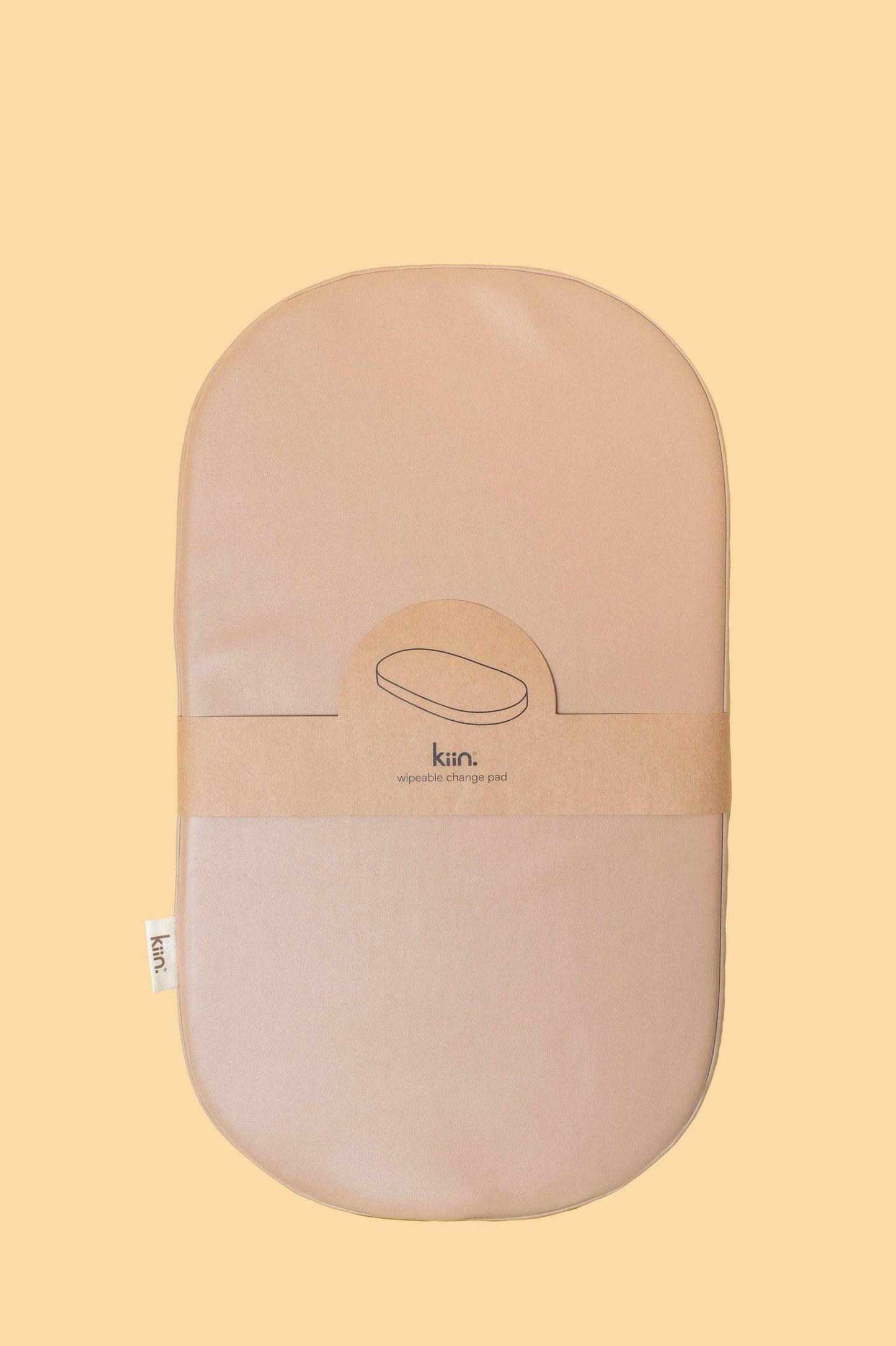 Kiin Wipeable Change Pad in beige vegan leather, waterproof and stain-resistant baby changing mat