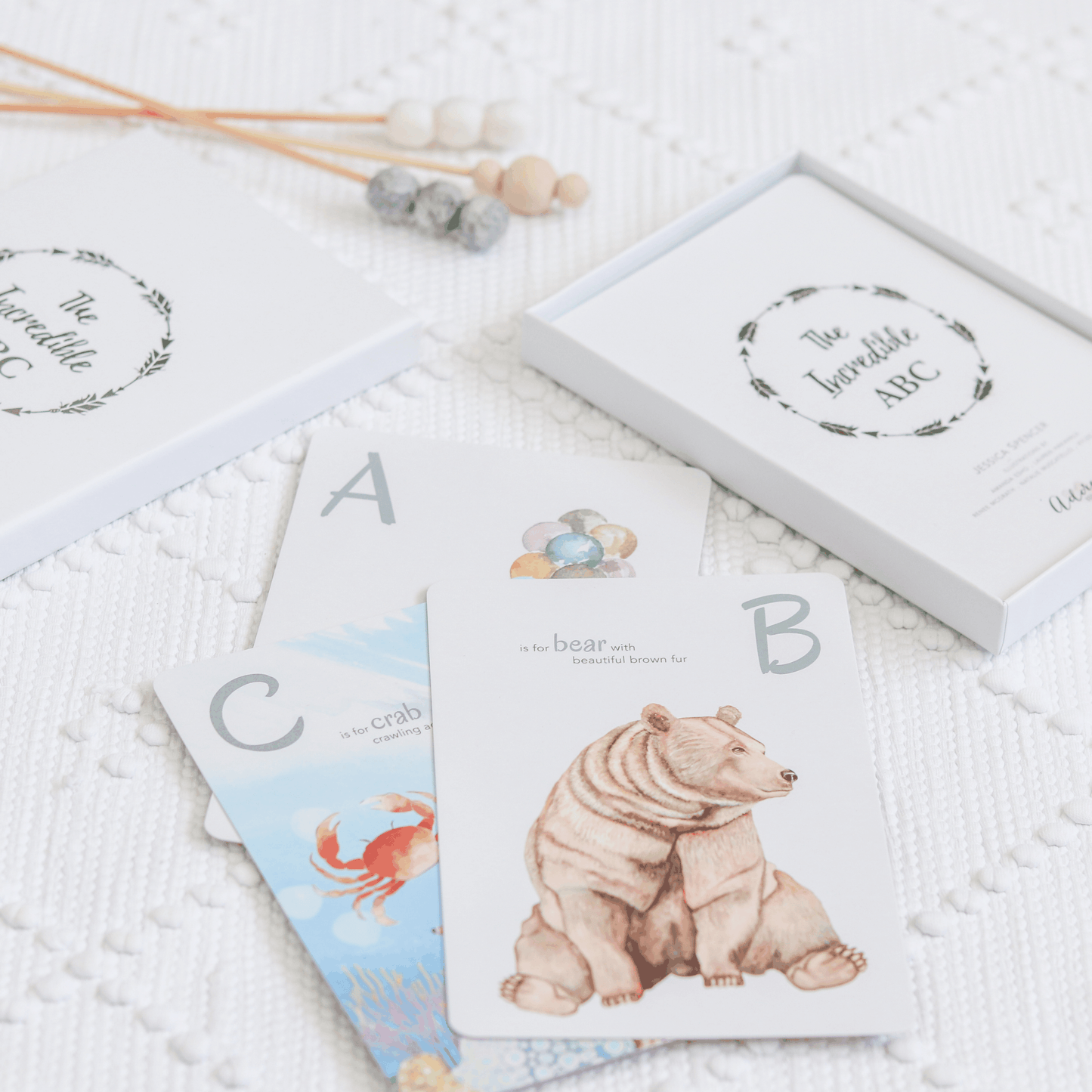 The Incredible ABC flash cards with watercolor animal illustrations including bear and crab, educational tool for children
