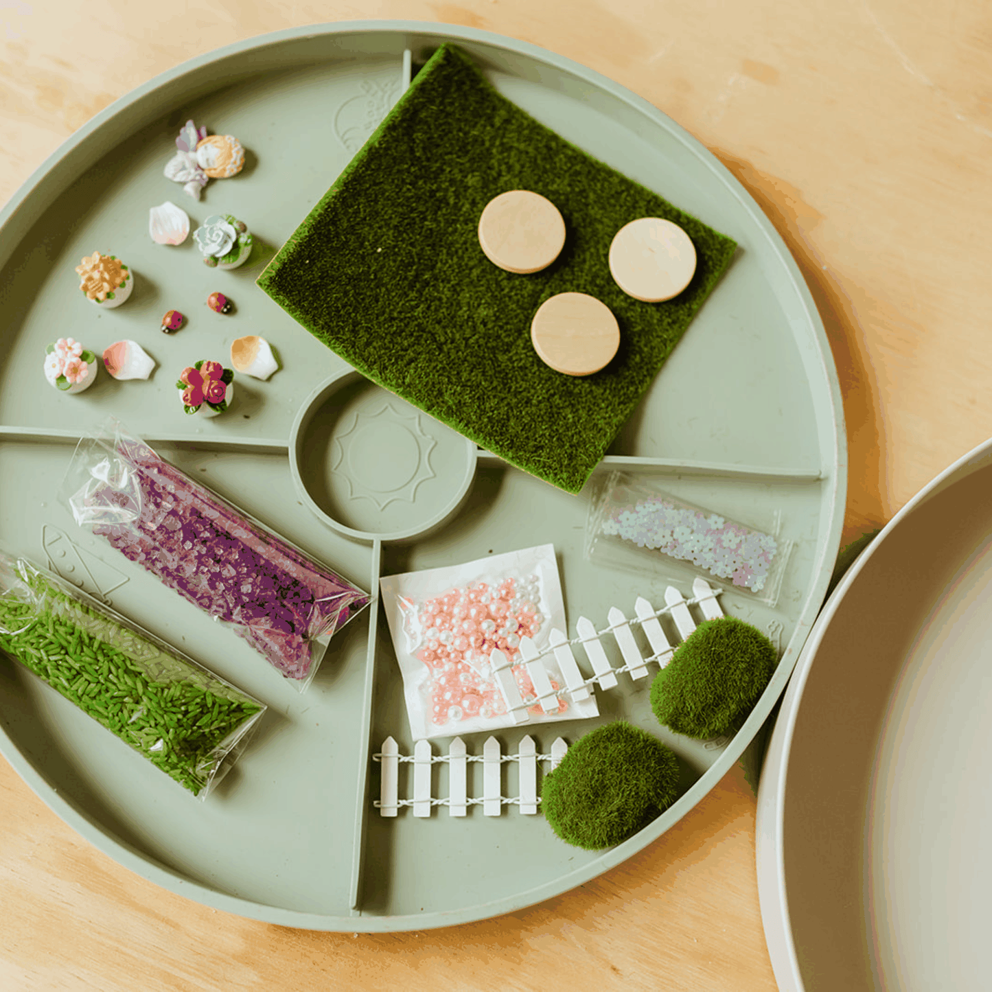 Sensory Kits Fairy Garden with faux grass, fairy figurine, petals, sequins, picket fence, ladybugs, rice base, and purple bath salt for imaginative play