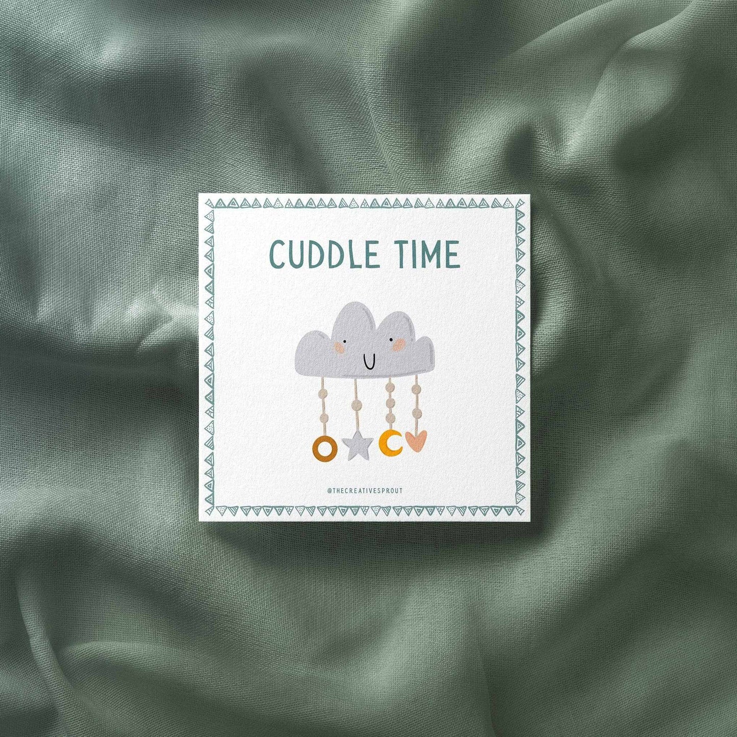 Routine Cards for Kids daily transition toolkit card with cute cloud illustration labeled cuddle time on green fabric background