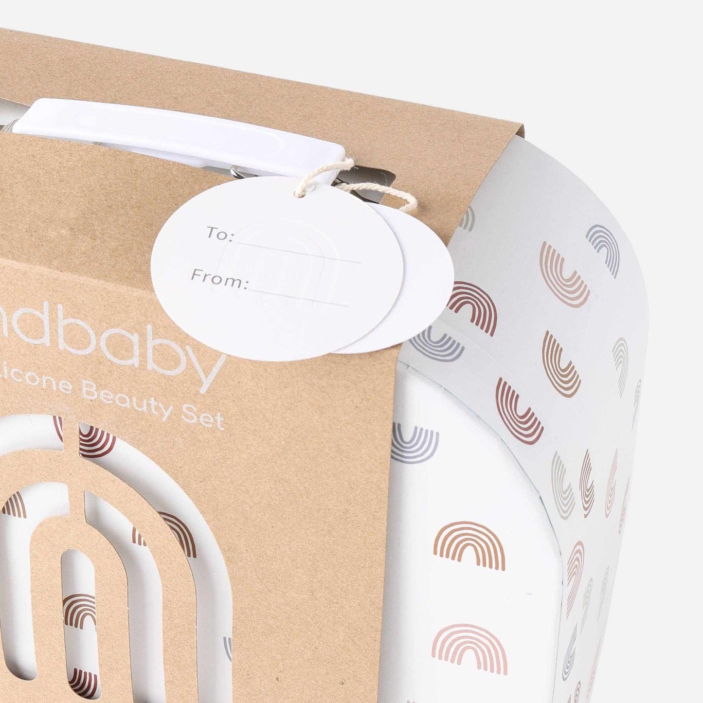 Kynd Silicone Beauty Set packaged in eco-friendly box with pastel rainbow design