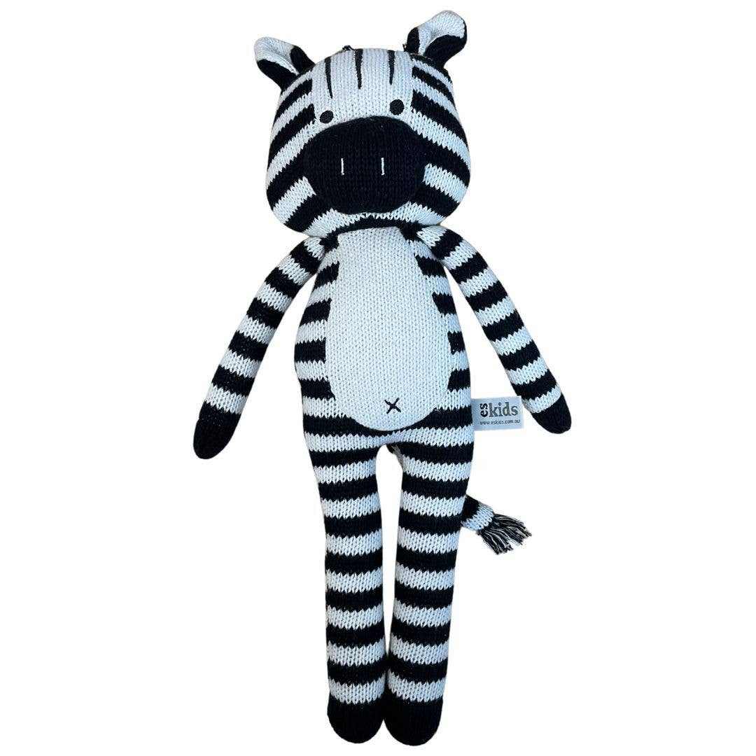 Zachary the Zebra knitted black and white zebra toy with eco-friendly cotton and recycled filling, 40cm tall.